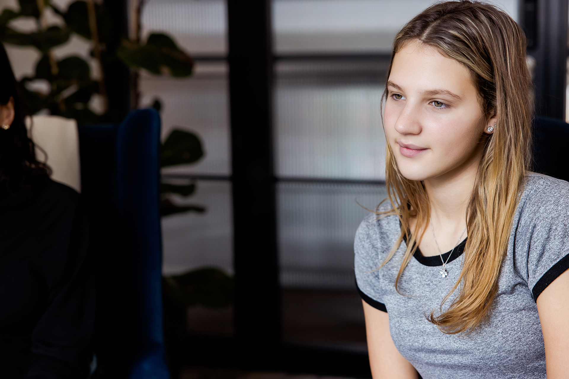 Teenage girl listening in therapy session